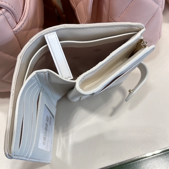 Kate Spade Carey Medium Compartment Bifold Wallet 
COLOR: Parchment - Picture 16 of 16